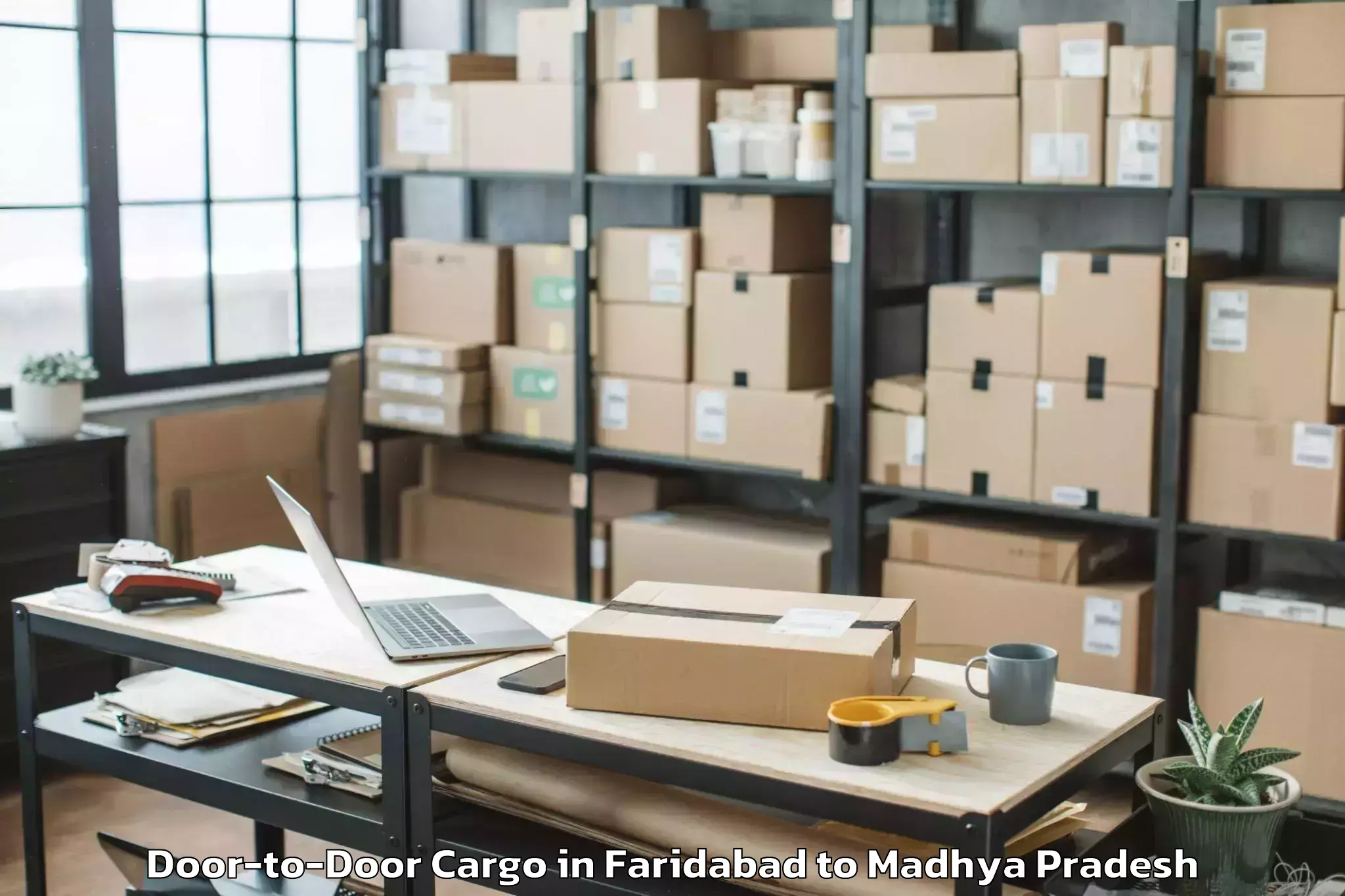 Book Faridabad to Sanwer Door To Door Cargo